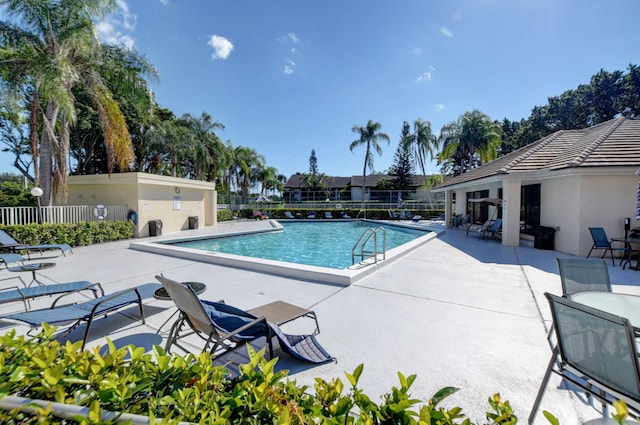 6328 Longboat Ln Unit 302, Boca Raton, FL 33433 - community pool featuring a patio area