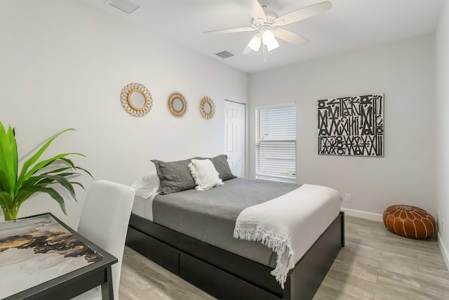 18 S D St, Lake Worth Beach, FL 33460 - bedroom featuring light wood finished floors, baseboards, a ceiling fan, and a closet