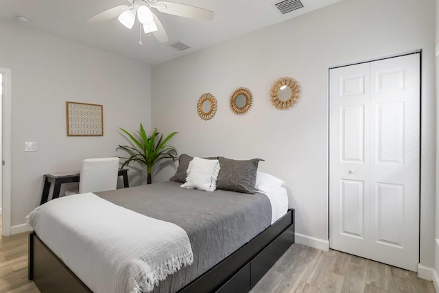 18 S D St, Lake Worth Beach, FL 33460 - bedroom featuring light wood-style flooring, baseboards, a closet, and ceiling fan