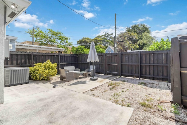 18 S D St, Lake Worth Beach, FL 33460 - view of patio / terrace with central AC unit and a fenced backyard