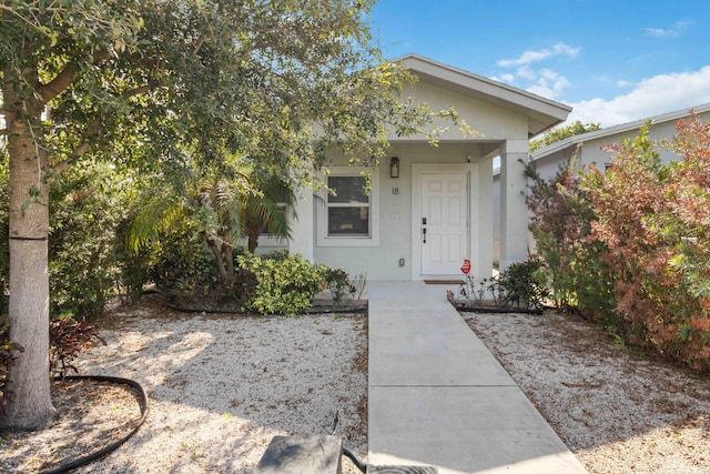 18 S D St, Lake Worth Beach, FL 33460 - view of exterior entry with stucco siding