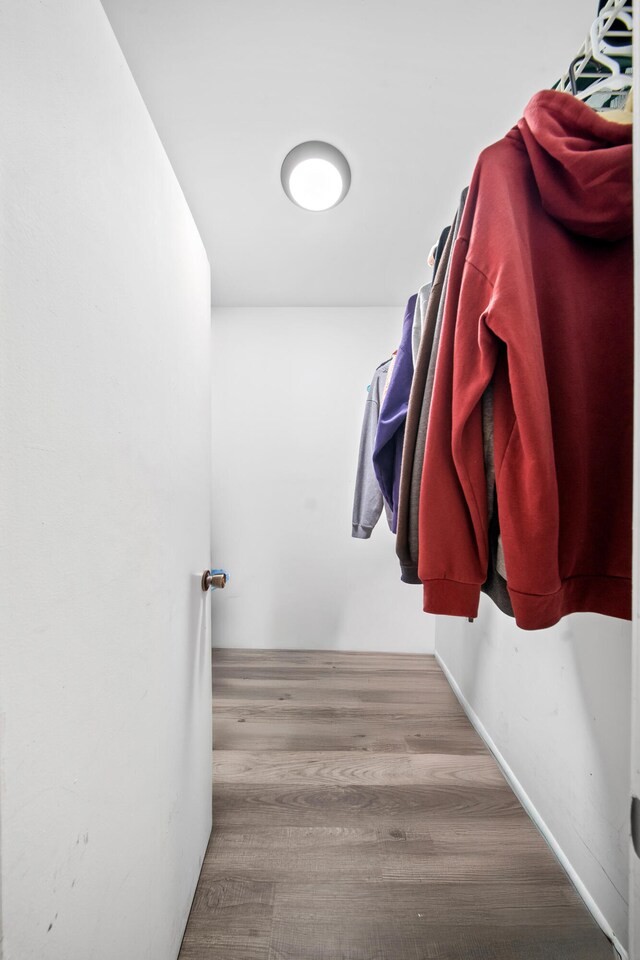 356 SE Prima Vista Blvd, Port Saint Lucie, FL 34983 - spacious closet with wood finished floors