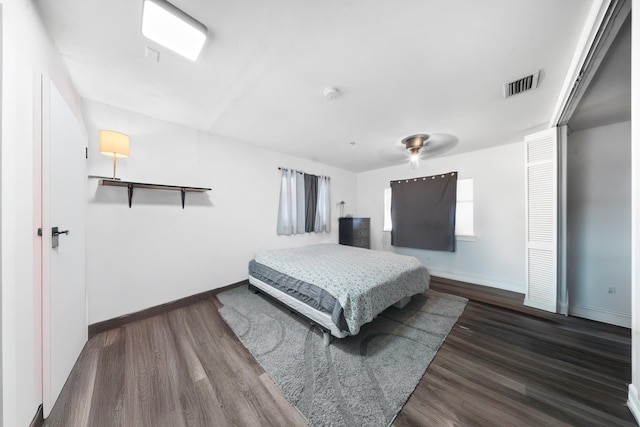 356 SE Prima Vista Blvd, Port Saint Lucie, FL 34983 - bedroom featuring baseboards and wood finished floors