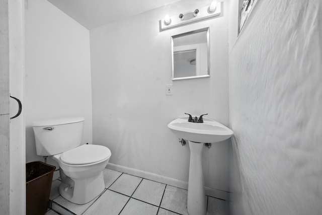 356 SE Prima Vista Blvd, Port Saint Lucie, FL 34983 - bathroom featuring tile patterned flooring, toilet, and baseboards