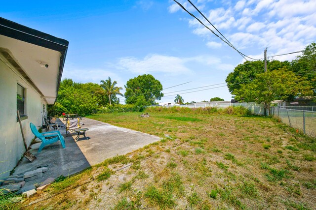 356 SE Prima Vista Blvd, Port Saint Lucie, FL 34983 - view of yard with a patio
