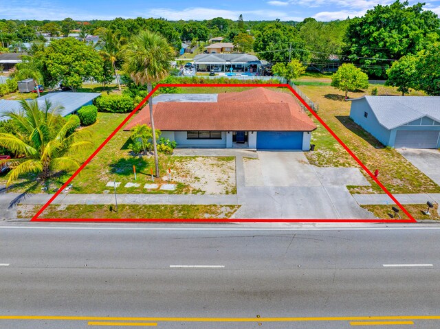 356 SE Prima Vista Blvd, Port Saint Lucie, FL 34983 - view from above of property featuring property parcel outlined