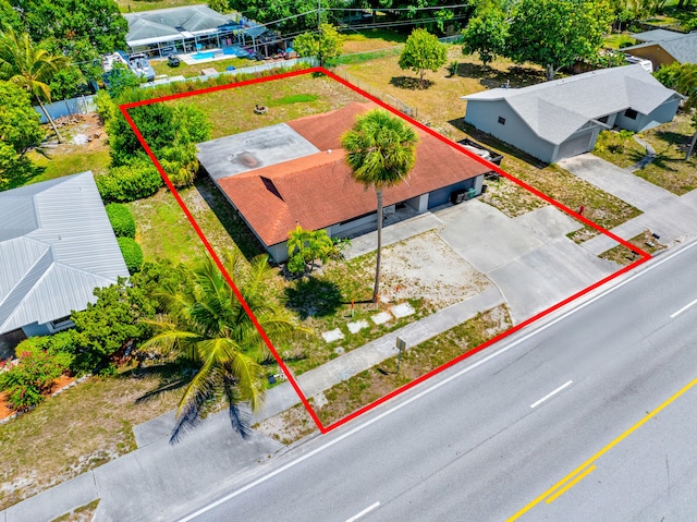 356 SE Prima Vista Blvd, Port Saint Lucie, FL 34983 - aerial view of property and surrounding area with property boundaries highlighted