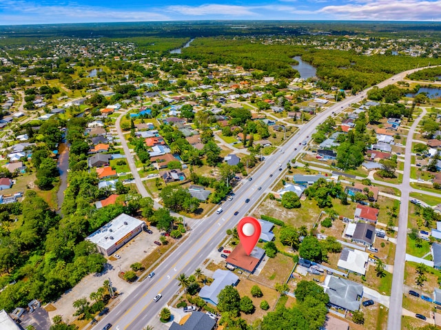 356 SE Prima Vista Blvd, Port Saint Lucie, FL 34983 - aerial view of property's location featuring a nearby body of water and nearby suburban area