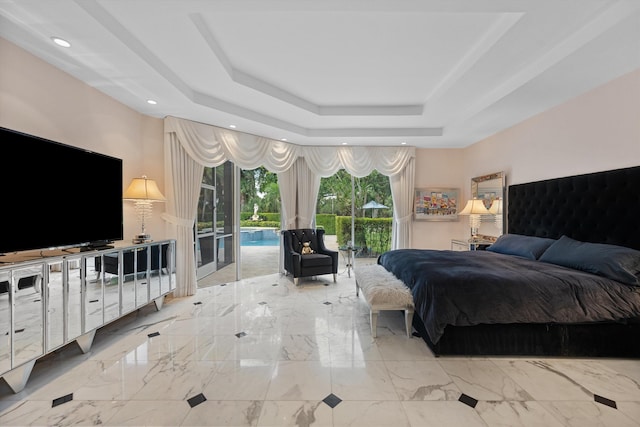 bedroom featuring a raised ceiling, access to outside, and recessed lighting