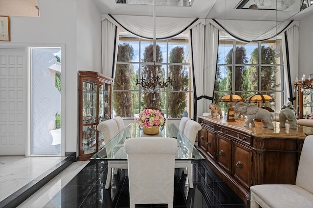 dining area featuring granite floors