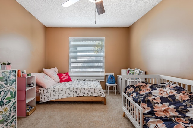 1915 Capeside Cir, Wellington, FL 33414 - bedroom featuring carpet floors, ceiling fan, and a textured ceiling