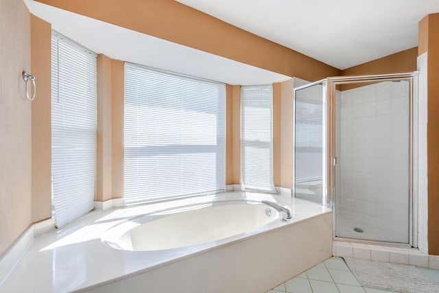 1915 Capeside Cir, Wellington, FL 33414 - bathroom featuring a stall shower, a garden tub, and tile patterned flooring