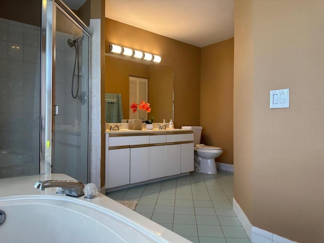 1915 Capeside Cir, Wellington, FL 33414 - full bath featuring a shower stall, double vanity, tile patterned floors, toilet, and a garden tub