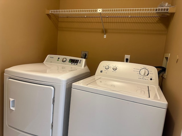 1915 Capeside Cir, Wellington, FL 33414 - washroom featuring washing machine and dryer