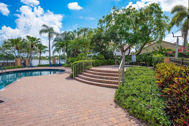 1915 Capeside Cir, Wellington, FL 33414 - community pool featuring a patio