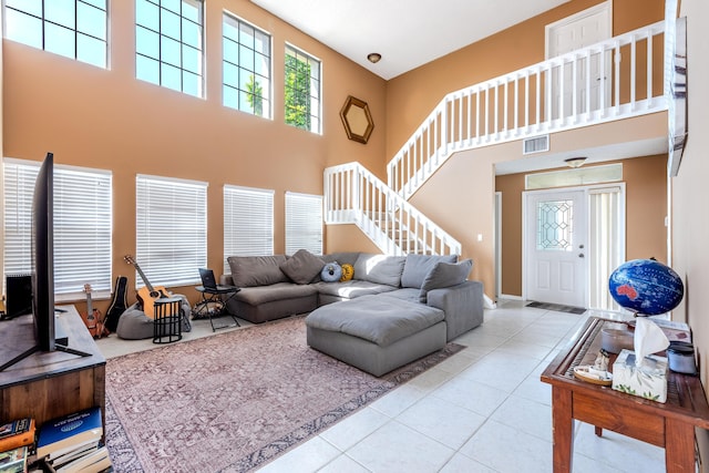1915 Capeside Cir, Wellington, FL 33414 - tiled living area with a high ceiling and baseboards