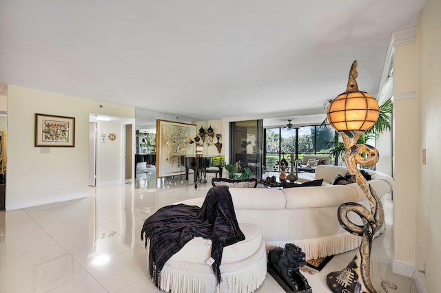 living room featuring tile patterned floors and baseboards