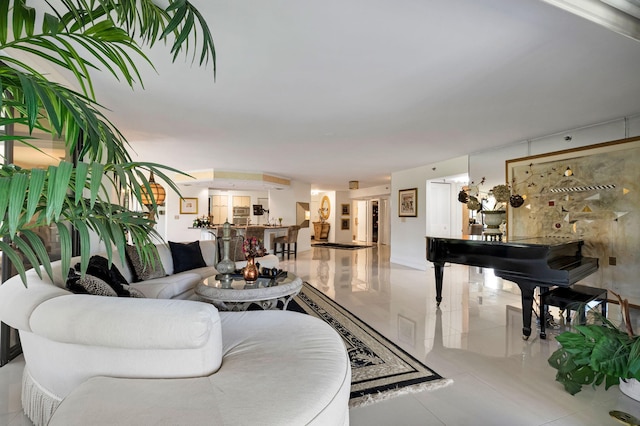 living area with tile patterned flooring