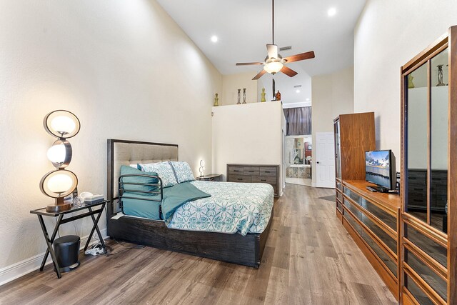 7793 Highlands Cir, Margate, FL 33063 - bedroom featuring high vaulted ceiling, wood finished floors, and baseboards