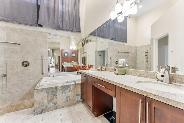 7793 Highlands Cir, Margate, FL 33063 - full bath with a walk in shower, a garden tub, tile patterned floors, double vanity, and a high ceiling