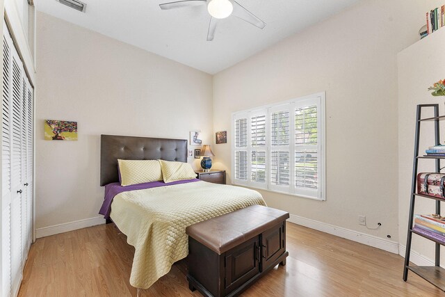 7793 Highlands Cir, Margate, FL 33063 - bedroom with light wood-type flooring, baseboards, ceiling fan, and a closet