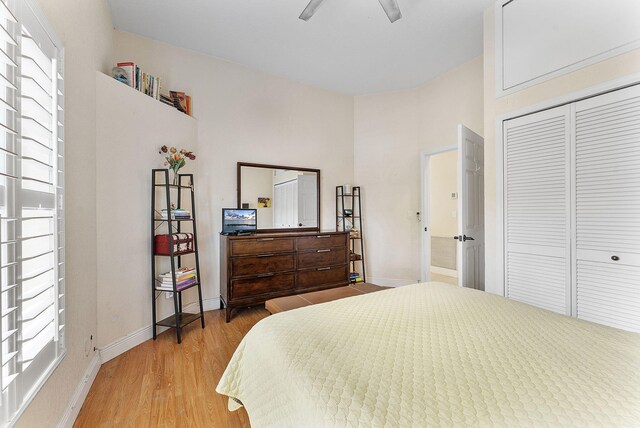 7793 Highlands Cir, Margate, FL 33063 - bedroom featuring light wood-style flooring, a closet, baseboards, and ceiling fan