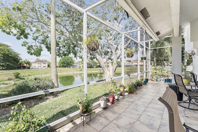7793 Highlands Cir, Margate, FL 33063 - sunroom / solarium featuring a water view