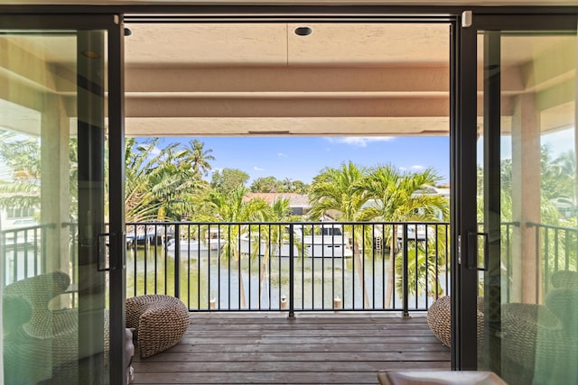balcony featuring a water view