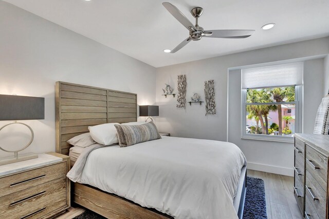 3704 Fairway Dr N, Jupiter, FL 33477 - bedroom with light wood-type flooring, baseboards, recessed lighting, and ceiling fan