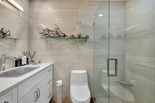 3704 Fairway Dr N, Jupiter, FL 33477 - bathroom featuring tile walls, a stall shower, toilet, and vanity