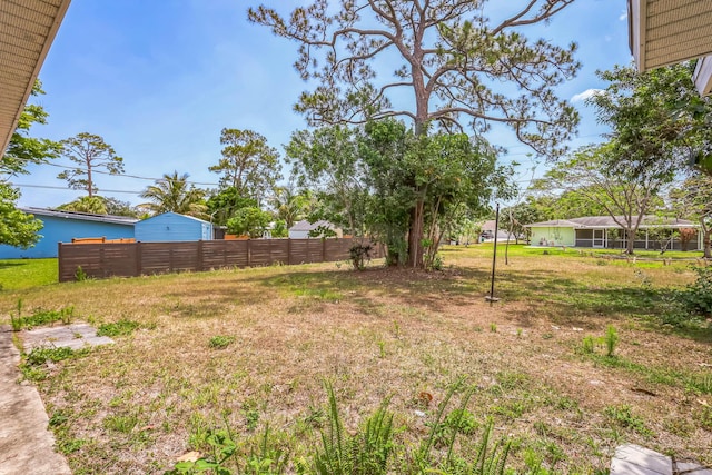 view of yard featuring fence