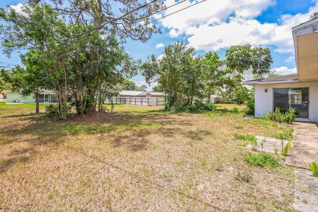 view of yard featuring fence