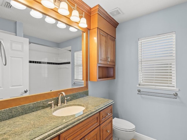 800 Alexandra Ave SW, Vero Beach, FL 32968 - bathroom with toilet, vanity, and a shower with curtain