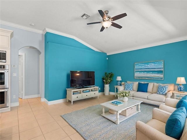800 Alexandra Ave SW, Vero Beach, FL 32968 - living room with a ceiling fan, arched walkways, ornamental molding, tile patterned floors, and lofted ceiling