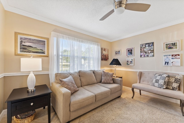 2520 Black Olive Blvd Unit 103, Delray Beach, FL 33445 - tiled living room with ornamental molding, a ceiling fan, baseboards, and a textured ceiling