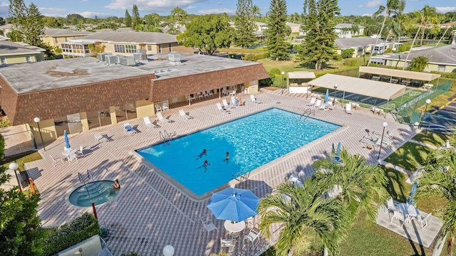 2520 Black Olive Blvd Unit 103, Delray Beach, FL 33445 - community pool with a patio area and a residential view