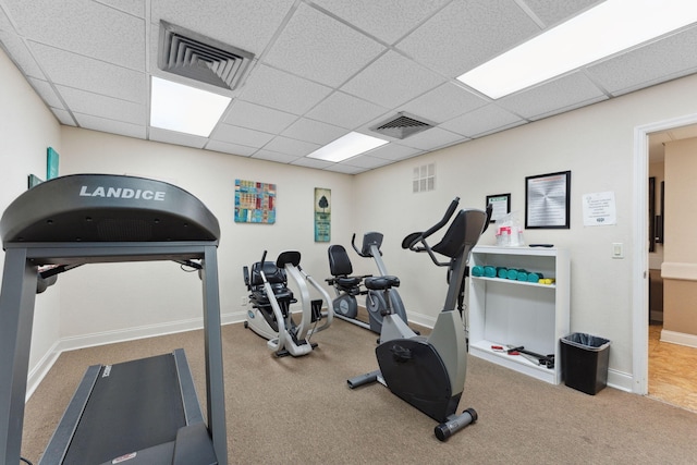 2520 Black Olive Blvd Unit 103, Delray Beach, FL 33445 - workout room featuring carpet flooring, a paneled ceiling, and baseboards