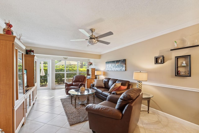 2520 Black Olive Blvd Unit 103, Delray Beach, FL 33445 - living room featuring light tile patterned flooring, a textured ceiling, ceiling fan, ornamental molding, and baseboards