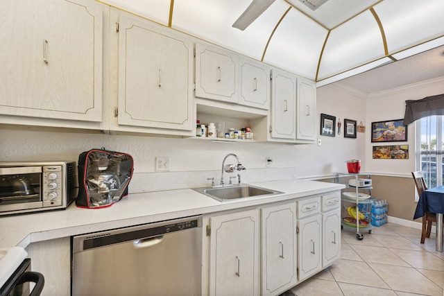 2520 Black Olive Blvd Unit 103, Delray Beach, FL 33445 - kitchen with dishwasher, a sink, ornamental molding, light tile patterned floors, and light countertops