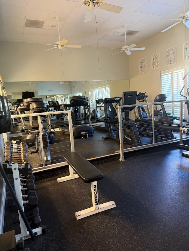 378 NW Sherry Ln, Port Saint Lucie, FL 34986 - gym featuring a high ceiling, a ceiling fan, and a paneled ceiling