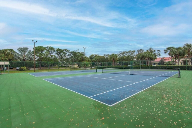 378 NW Sherry Ln, Port Saint Lucie, FL 34986 - view of tennis court with fence and community basketball court