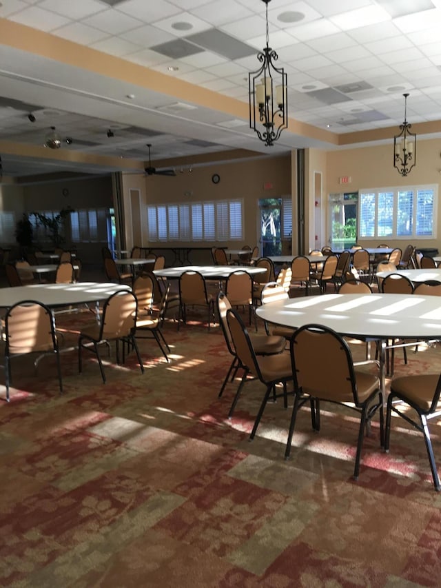 378 NW Sherry Ln, Port Saint Lucie, FL 34986 - carpeted dining space with a paneled ceiling