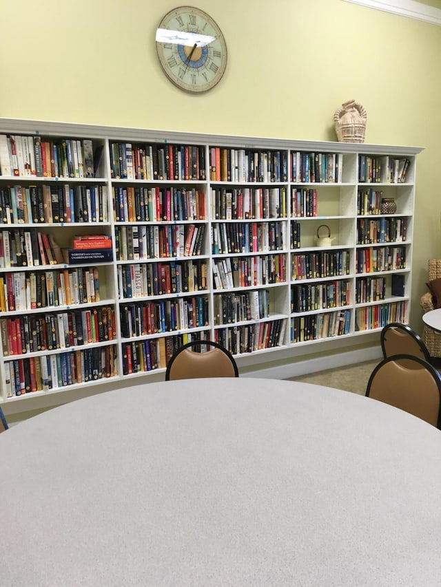 378 NW Sherry Ln, Port Saint Lucie, FL 34986 - living area with bookshelves