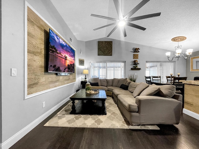living area featuring vaulted ceiling, a chandelier, wood finished floors, ceiling fan, and baseboards
