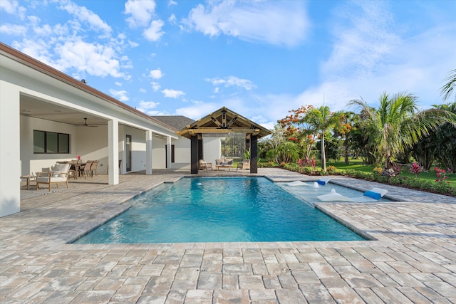 16149 73rd Ter N, West Palm Beach, FL 33418 - outdoor pool with a patio area, a ceiling fan, a gazebo, and outdoor lounge area