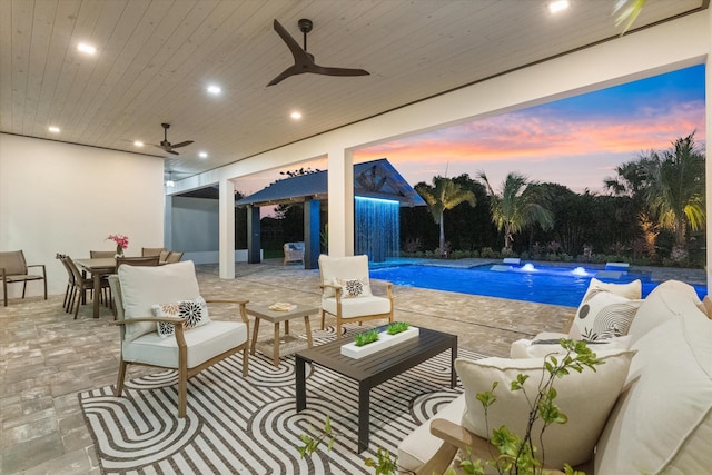 16149 73rd Ter N, West Palm Beach, FL 33418 - view of patio featuring outdoor lounge area, a ceiling fan, an outdoor pool, and outdoor dining space