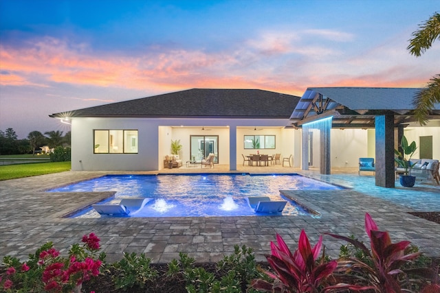 16149 73rd Ter N, West Palm Beach, FL 33418 - swimming pool with a jacuzzi, a patio area, and outdoor dining space
