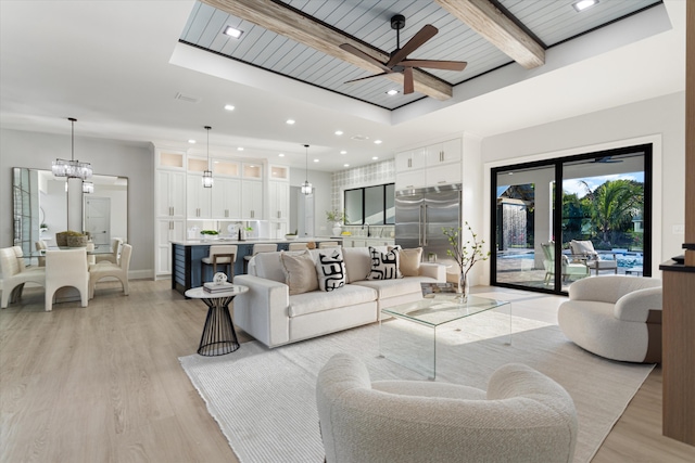 16149 73rd Ter N, West Palm Beach, FL 33418 - living area featuring a ceiling fan, light wood-style floors, recessed lighting, beamed ceiling, and a chandelier
