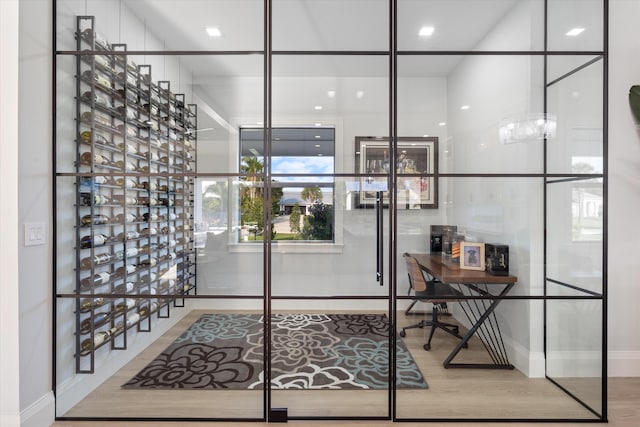 16149 73rd Ter N, West Palm Beach, FL 33418 - wine room with wood finished floors and baseboards