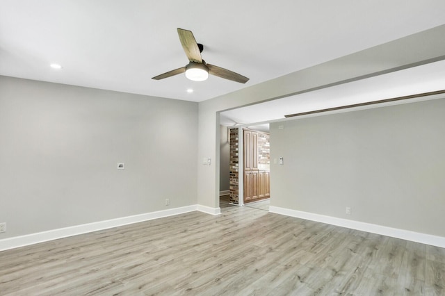 825 Northern Dr, Lake Park, FL 33403 - spare room featuring baseboards, light wood-style flooring, a ceiling fan, and recessed lighting